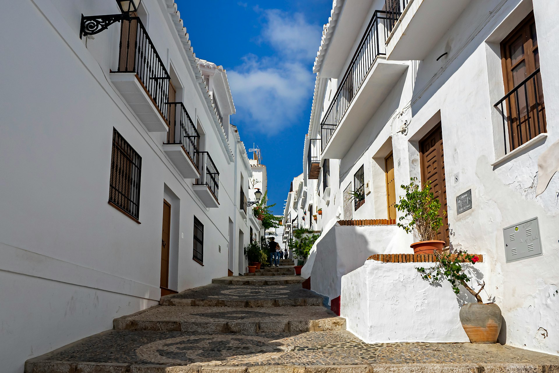 white concrete building under blue sky during daytime
